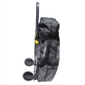 Compact cart with inflatable kayak strapped into position.