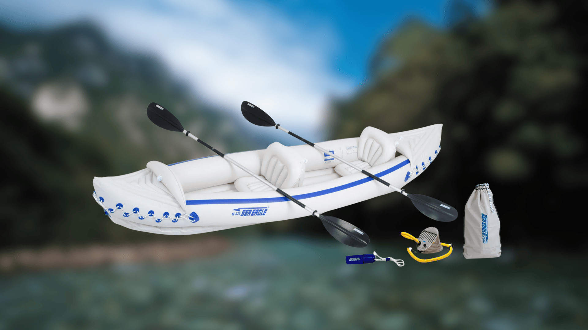 White and blue Sea Eagle SE-370 inflatable kayak with two paddles, a pump, and a carry bag.