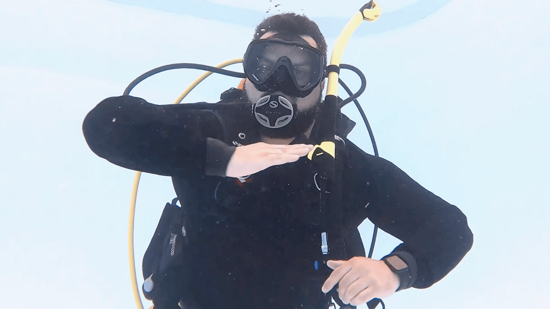 out of air scuba hand signal