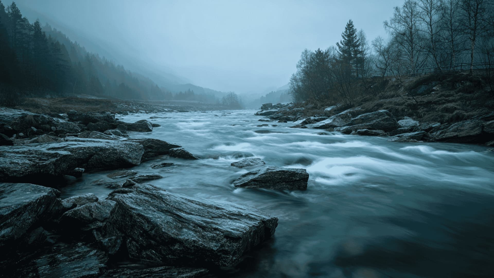 Fast-running river between rocky banks, steady flowing soundscape used for sleep, study, and white noise.
