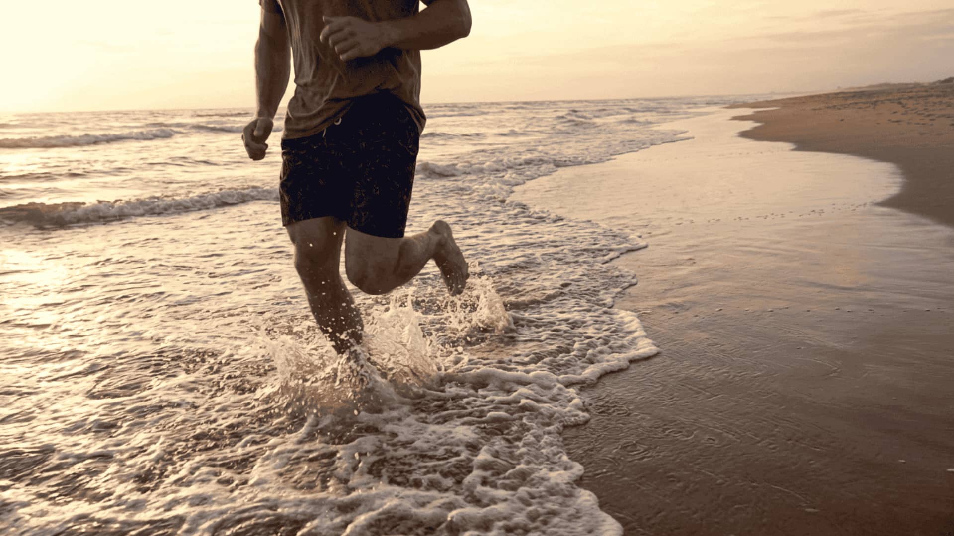 Runner doing shallow water running in a waist-deep pool, light splashes, controlled stride for joint-friendly cardio