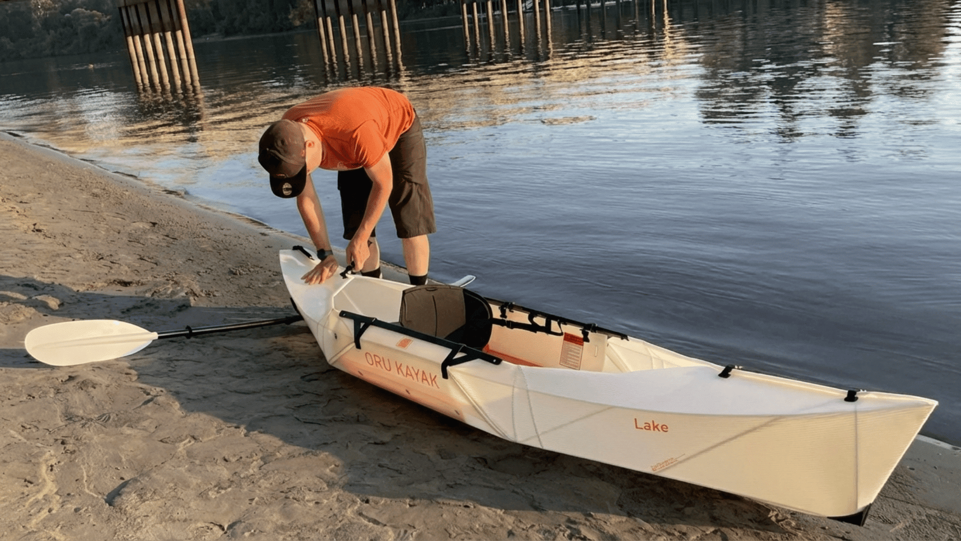 man-setting-up-oru-lake-kayak