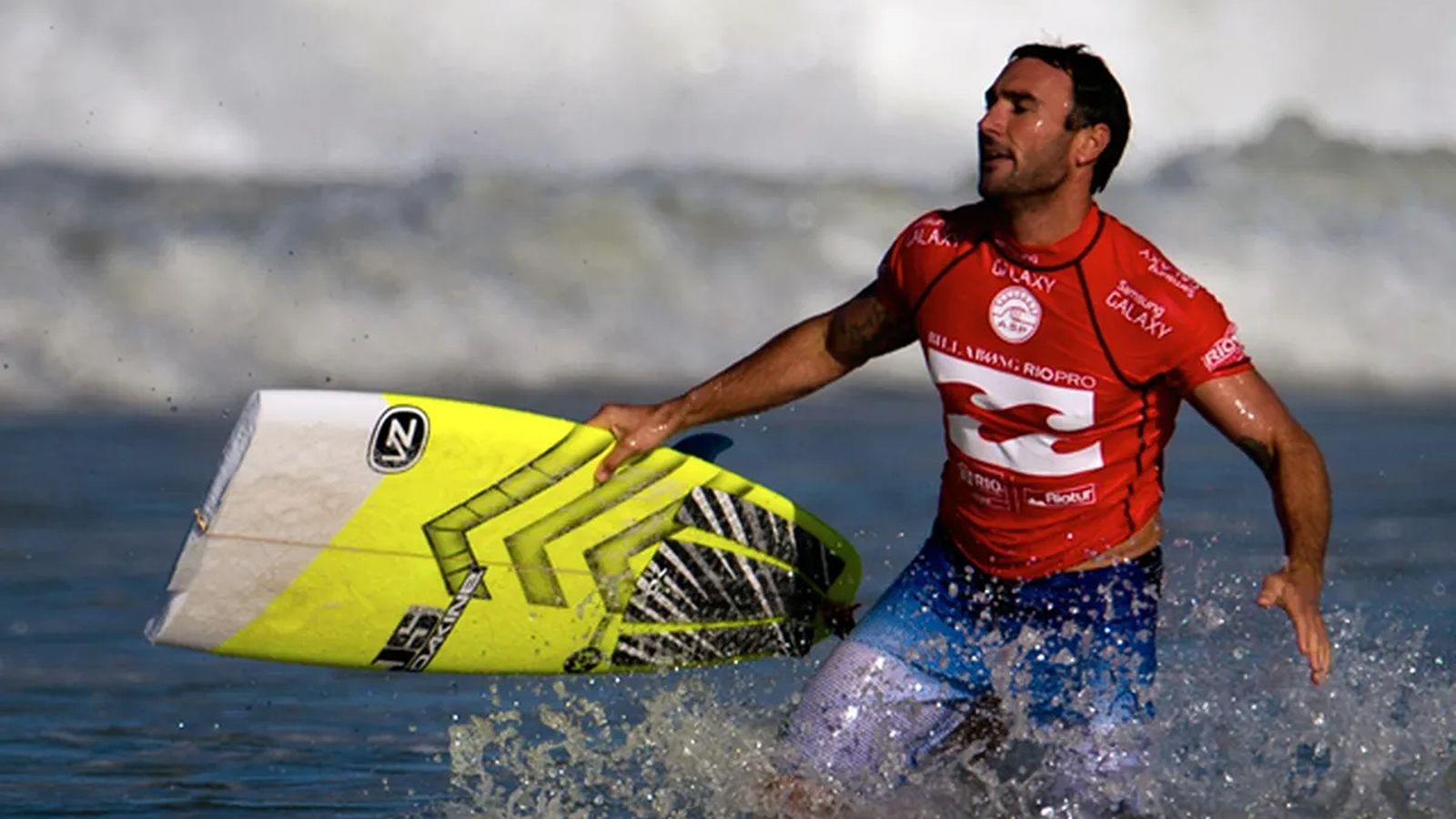 Joel Parkinson with surf board