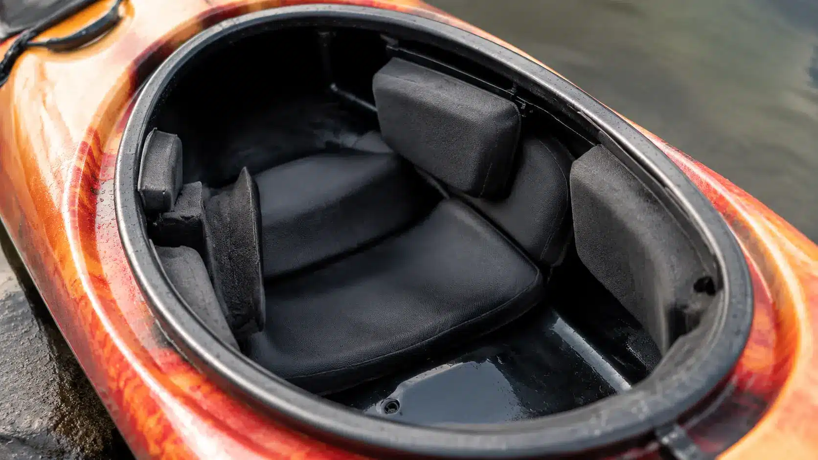 Custom foam outfitting inside kayak cockpit