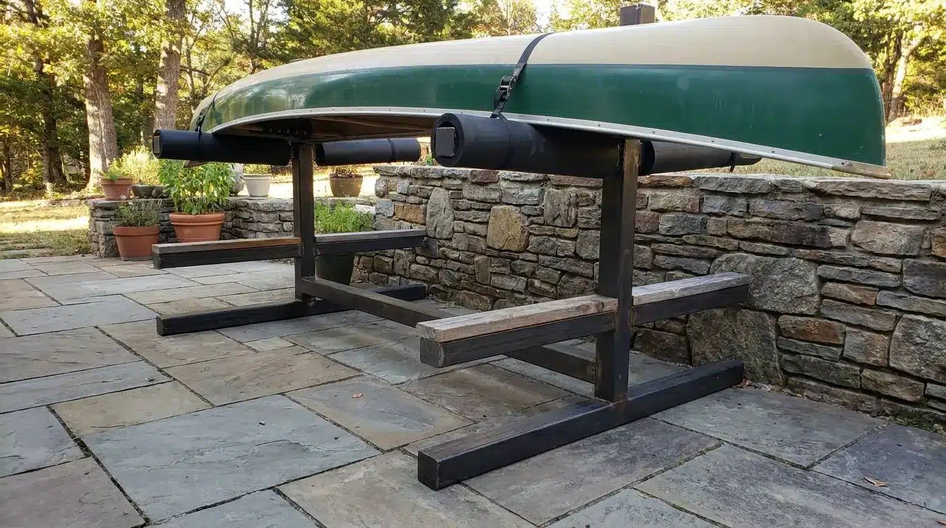 Freestanding canoe rack holding a canoe on patio
