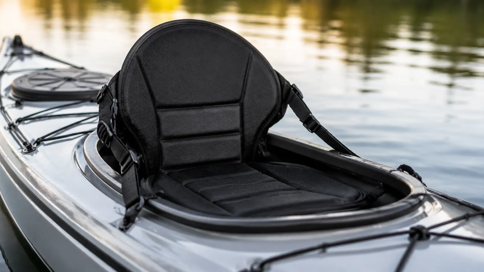 Low-profile touring kayak seat mounted on kayak deck