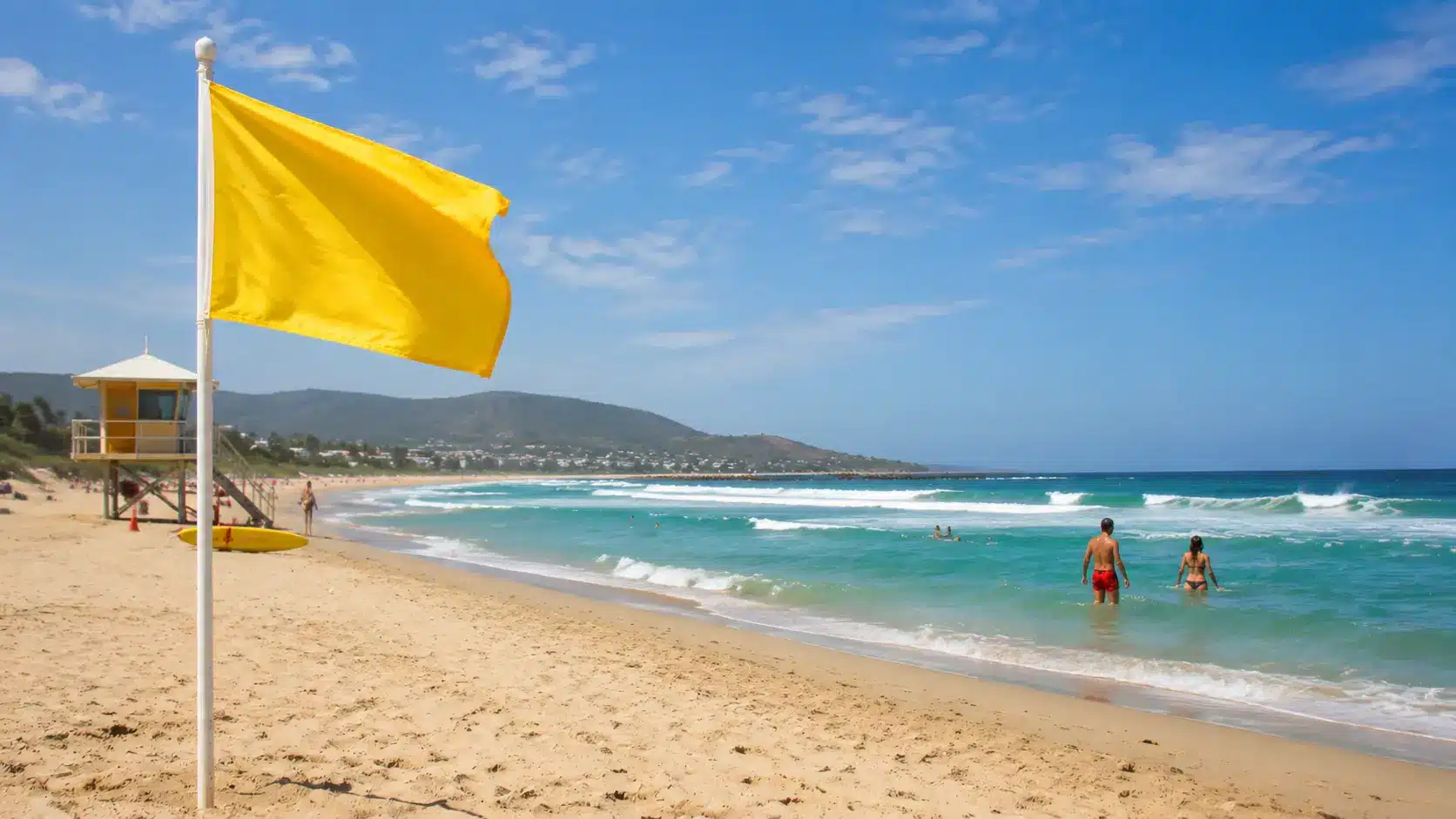 Sunny beach with lifeguard tower