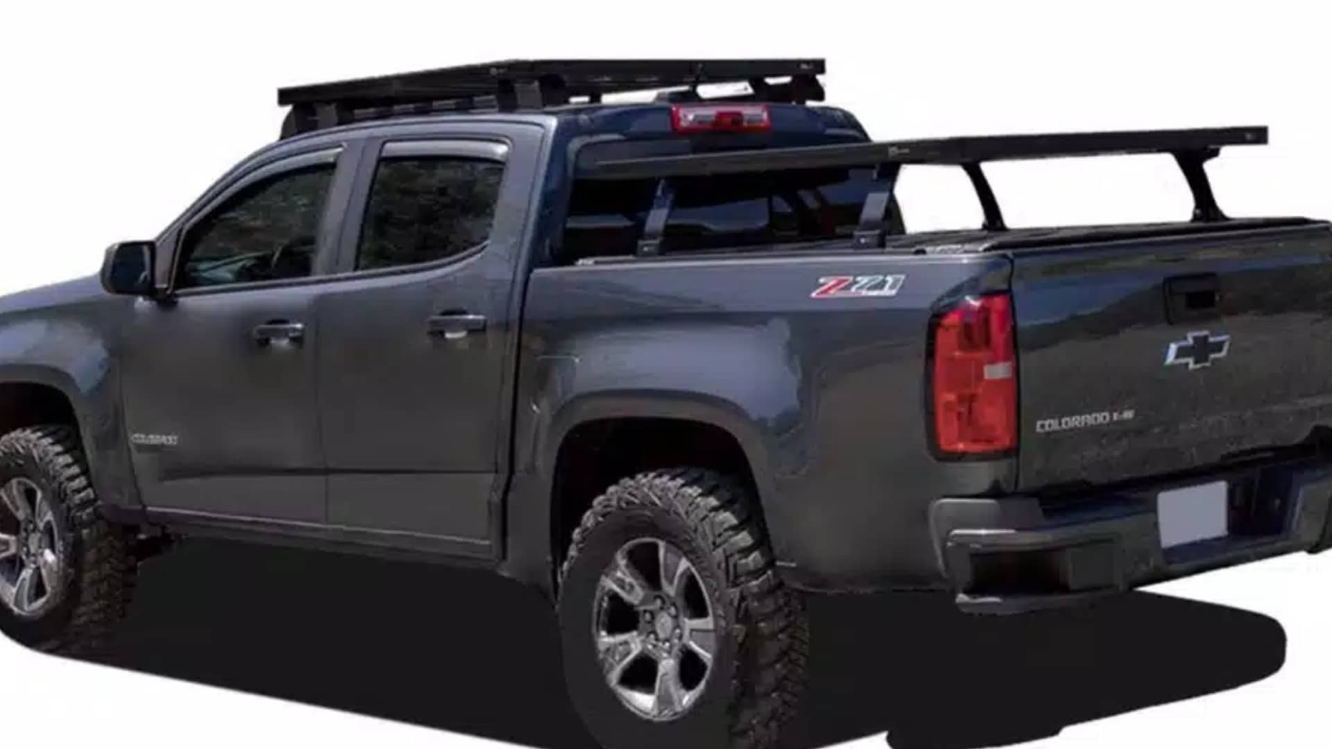 A Front Runner Slimline II roof rack and matching bed rack installed on a grey Chevy Colorado Z71 truck.