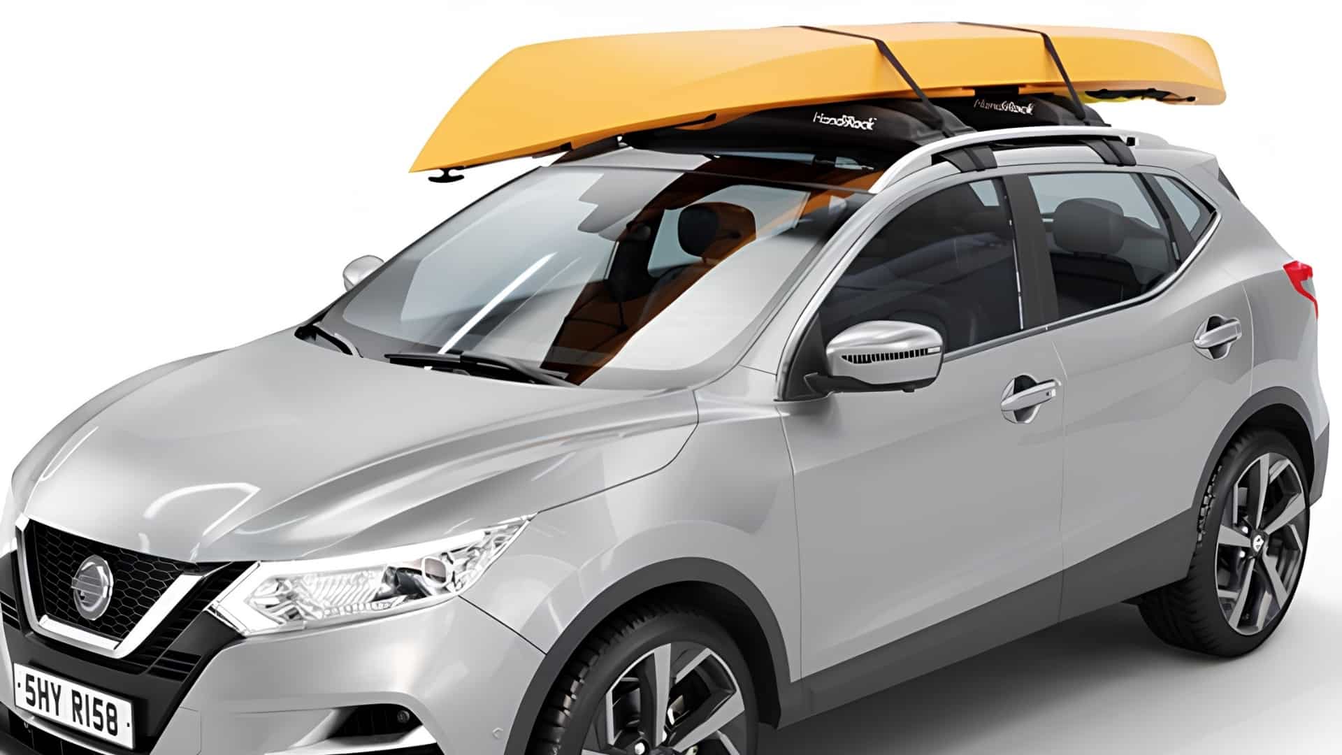 A yellow kayak strapped to a HandiRack Universal Inflatable Roof Rack on a silver SUV.