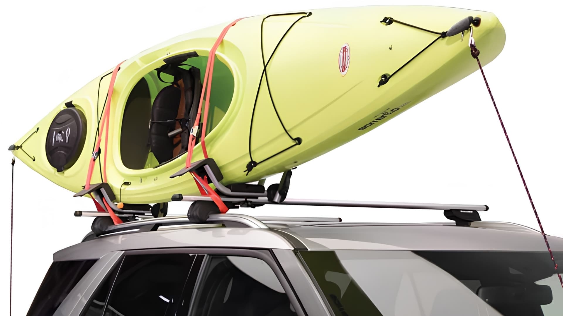 A yellow kayak strapped to a Malone Downloader roof rack system on a silver SUV.