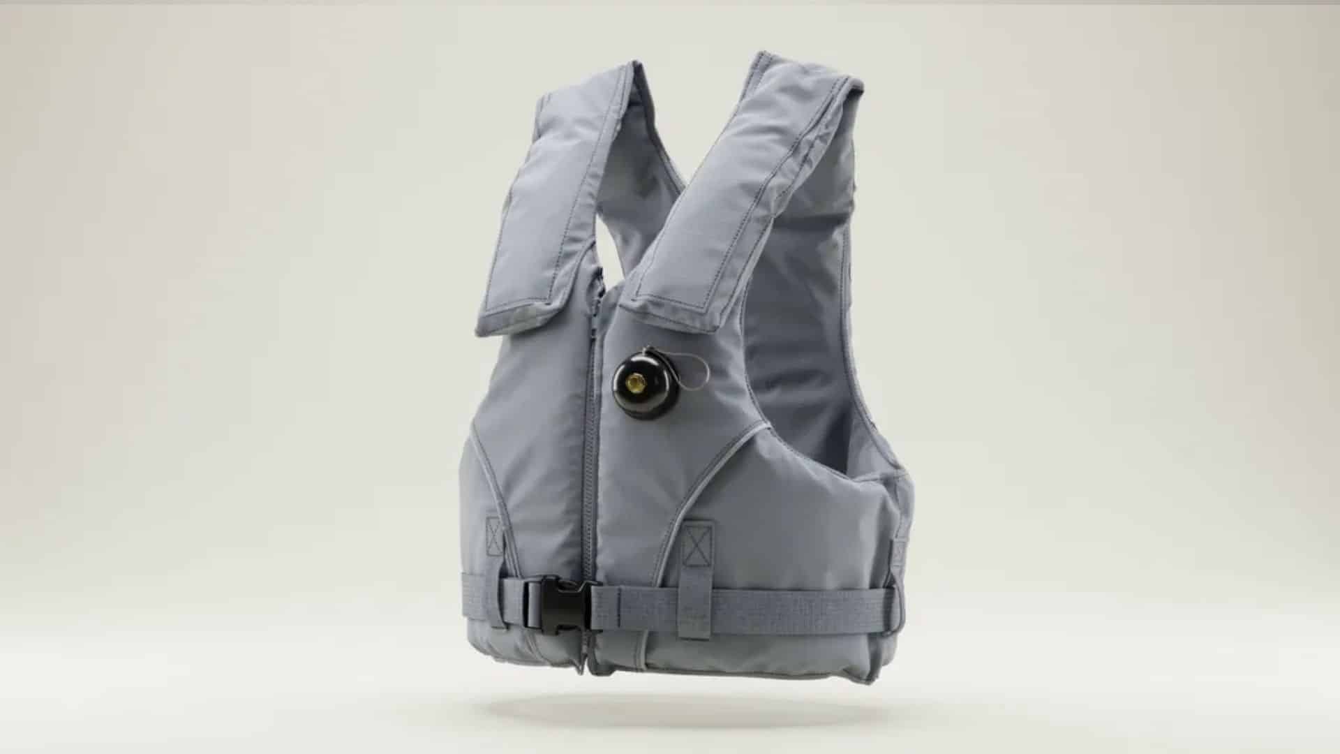 Grey Type V special use life jacket with inflation cylinder on neutral background