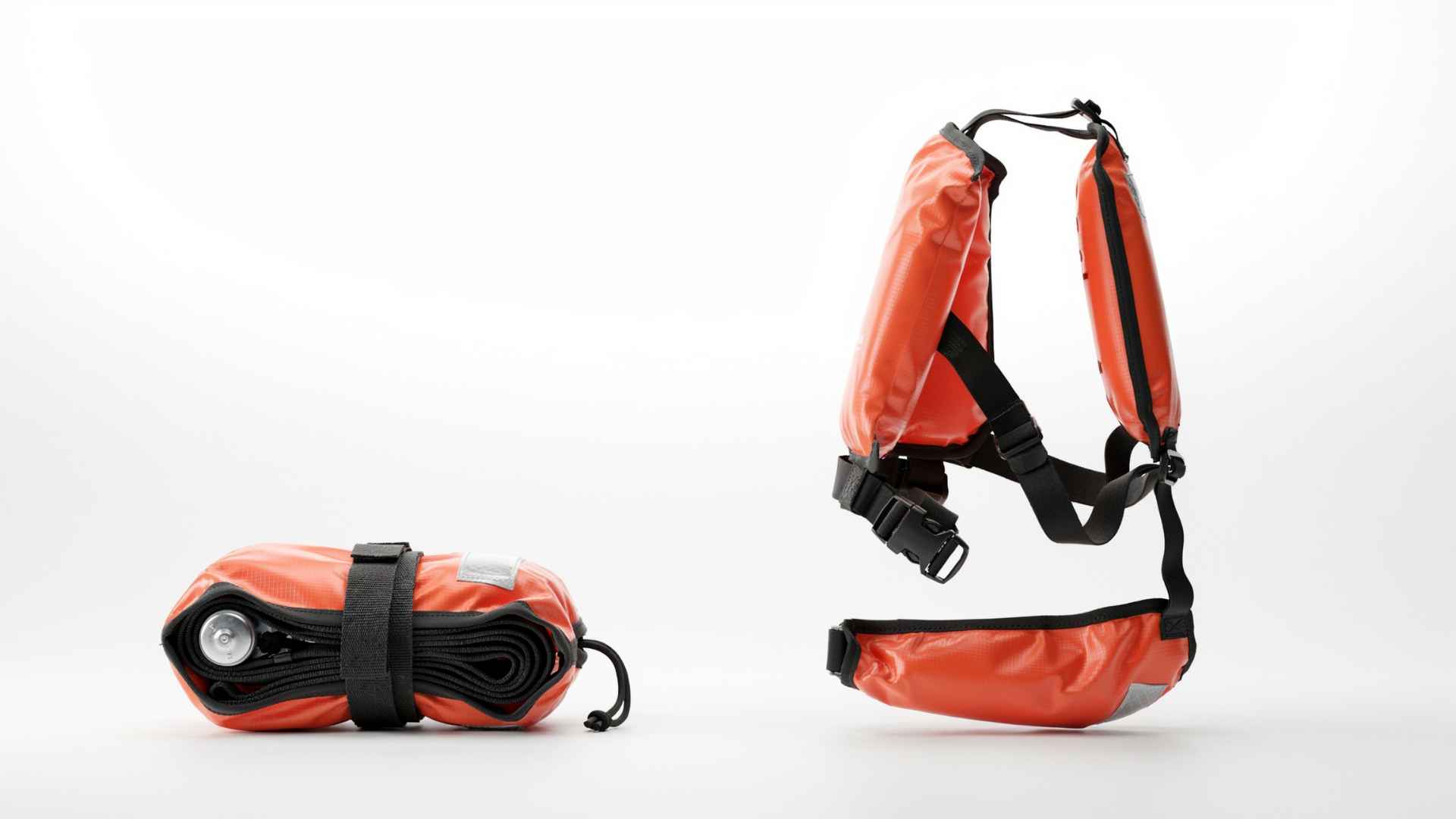 Inflatable life vest folded on white studio background