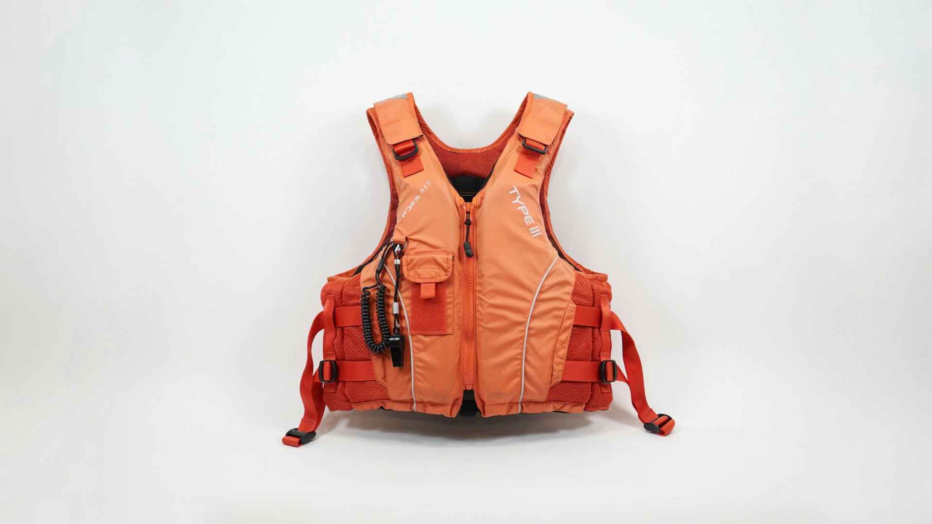 Special use life vests arranged on white background