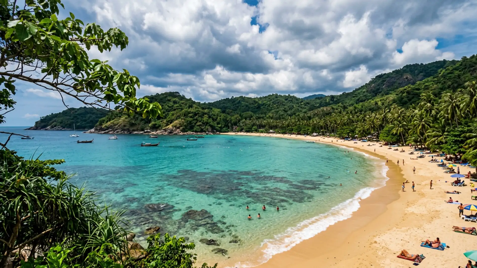 Clear blue ocean waters meet a sandy beach surrounded by lush tropical forests and palm trees under a bright sky
