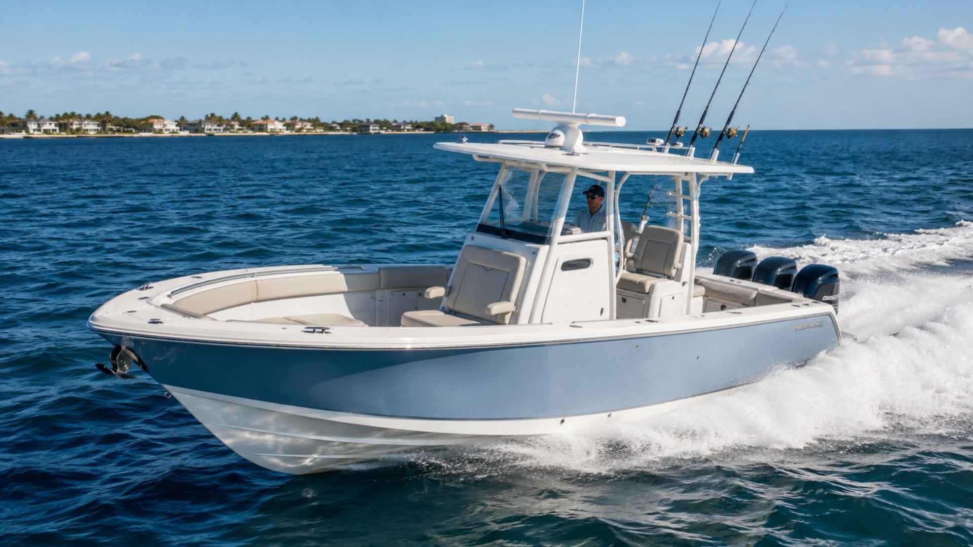 Center console boat speeding across coastal waters with fishing gear and open deck layout visible