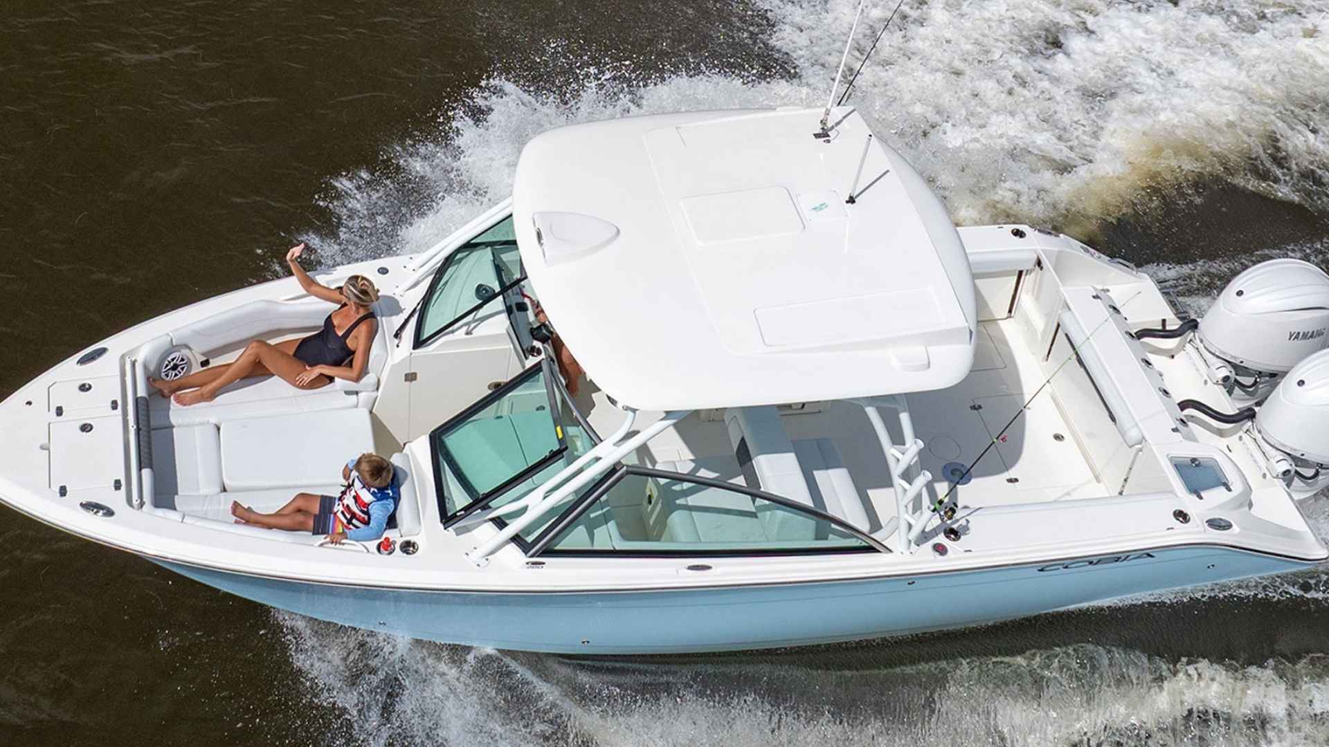 Cobia 305 CC center console fishing boat with open deck layout