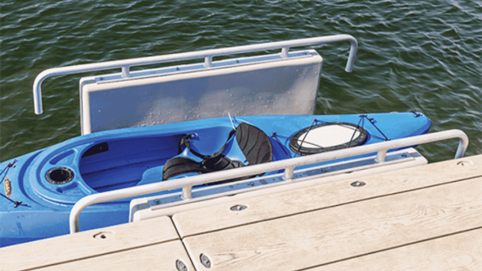 Connect-A-Dock YAKport Kayak cradle launch system mounted on a dock holding a kayak securely above the water.