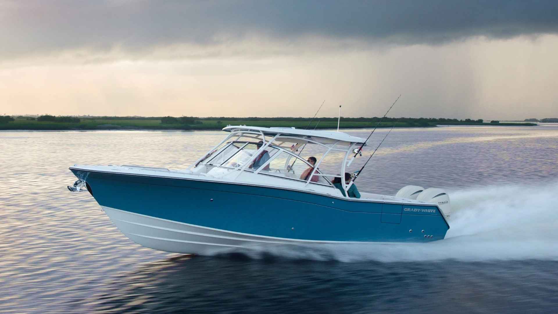 Grady-White Freedom 307 offshore fishing boat cutting through waves