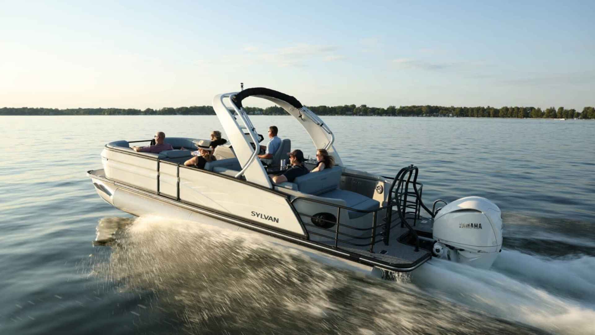 Sylvan pontoon boat with anglers fishing on the water