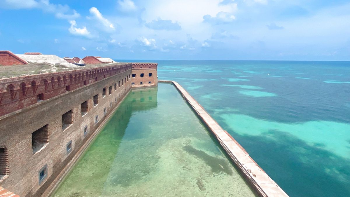 Dry Tortugas National Park with Fort Jefferson, clear ocean water, and reef areas near the historic fort