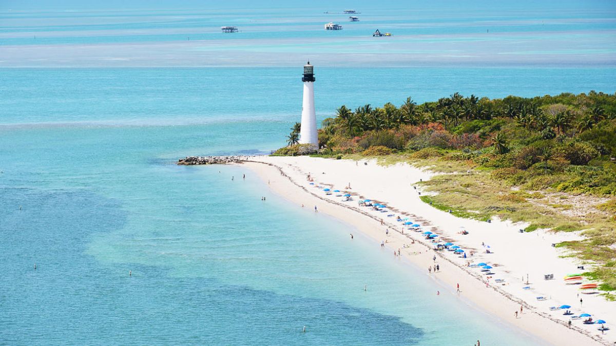 Key Biscayne Miami with Cape Florida Lighthouse, calm ocean water, and coastal snorkeling areas